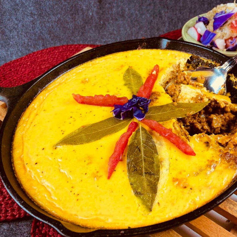 We also made Bobotie from South Africa. It has ground meat that is spiced w/ curry, turmeric, cumin, garlic, herbs, s, & p. Some recipes add raisins. It is baked, topped with an egg, milk custard & garnished with bay leaves as desired. Find the #recipe gloriagoodtaste.com