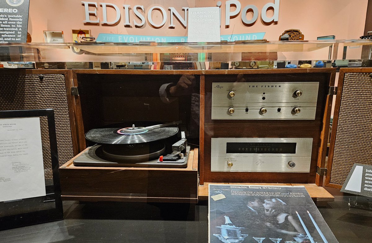 President JFK’s portable Fisher Allegro Stereo accompanied him on his global travels, allowing him to enjoy his favorite music no matter where he went. Also featured is his personal copy of 'Jackie Gleason Presents Champagne, Candlelight and Kisses' resting on the turntable.