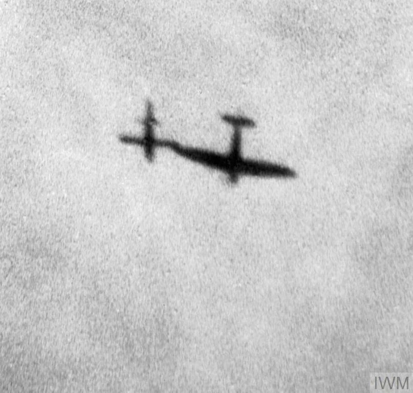 A Royal Air Force Spitfire uses it's wing tip to deflect a German V-1 flying bomb from its target, 1944