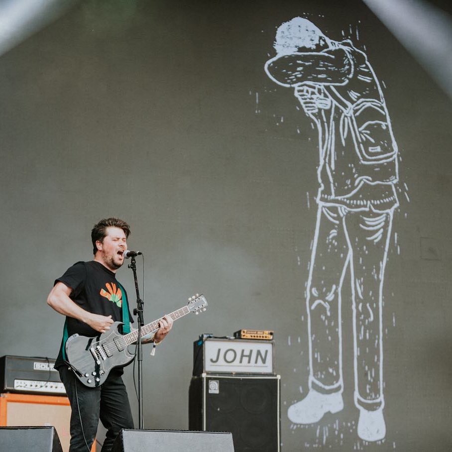 A nice one of our Johnny givin’ it on @beardedtheory main stage back in 2022. A reminder that we head back to some fields this Summer including the wonderful @GreenManFest - lookin’ forward to seeing those eyes starin’ back.