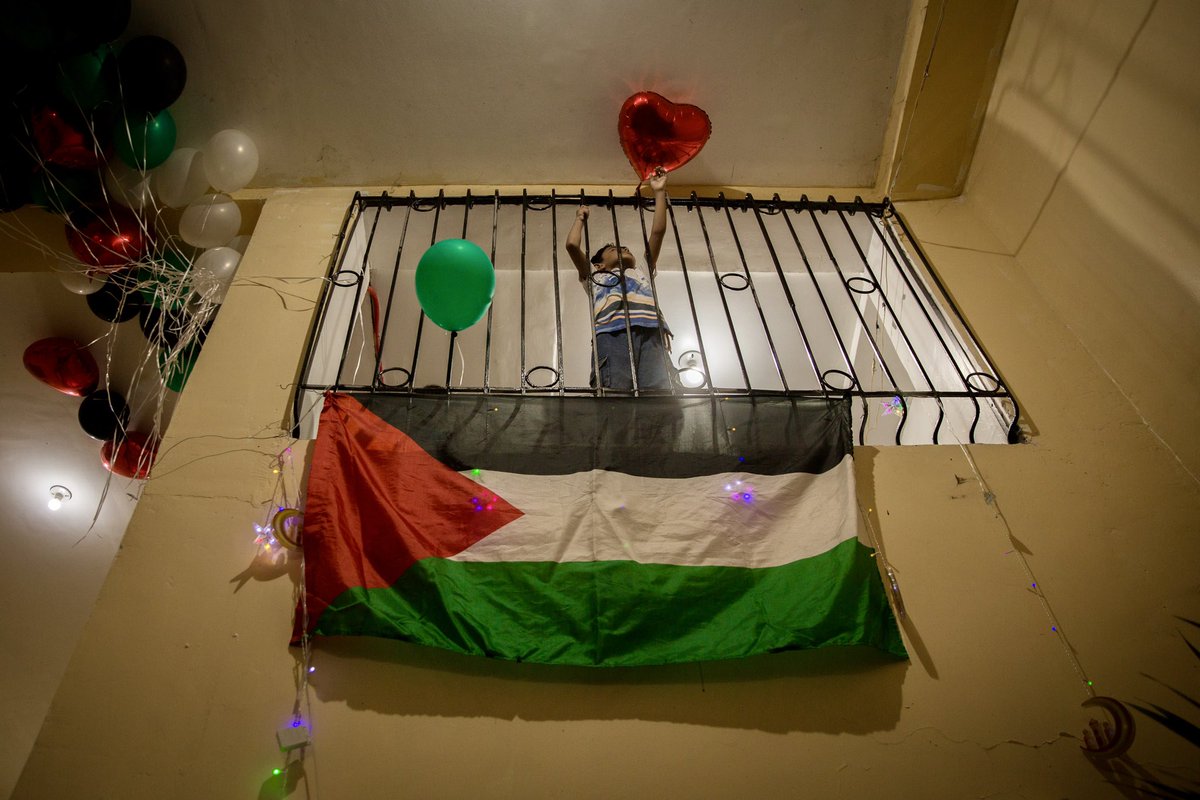 A child reaches for a heart-shaped balloon during the Little Gaza Kitchen, a pop-up solidarity food bazaar by Palestinian refugees who fled Gaza from Israel’s genocidal occupation held in Quezon City on March 29, 2024. #endthegenocide #ceasefirenow #freepalestine