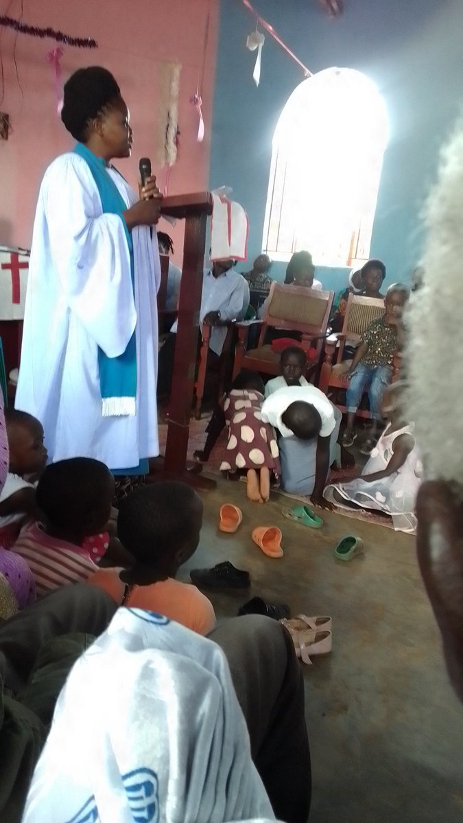 Lay reader Harriet Kagoma of St Luke's Nankoma church of Ug.presenting Easter sermon to christians ,East Busoga Diocese.