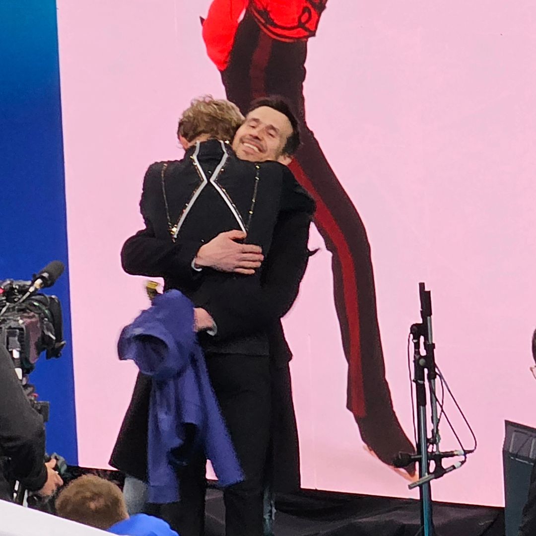 Ilia with his father, Roman Skorniakov, after his victorious free skate at  2024 World Championships today! 📸 axellentquads