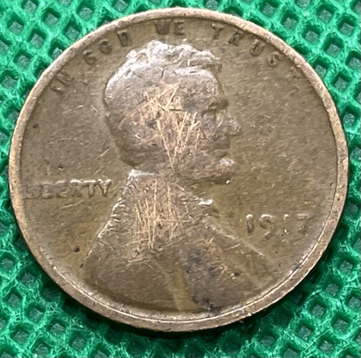 I found wheat pennies from five decades in the same box. Lastly, a very worn and scratched 1917. They made almost 200 million of these; still pretty amazing to find in circulation after 107 years. That's it; there weren't any 1909s.