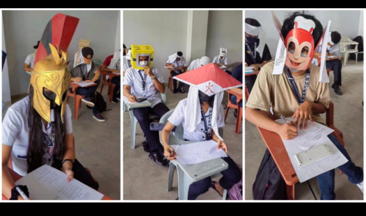 ismael_3Js's tweet photo. The students at a college in Legazpi City, Philippines came up with the idea for the anti-cheating hats after their professor, Mary Joy Mandane-Ortiz, introduced the concept to them. Professor Mandane-Ortiz discovered the idea while scrolling through her social media feed and decided to implement it in her class to promote honesty and integrity during exams. She instructed her students to create their own hats using simple designs, which led to a burst of creativity among the students. 

The students used various materials like egg boxes, cardboard, and Halloween masks to craft these hats, aiming to obstruct their peripheral vision and prevent cheating during exams. The students embraced the challenge enthusiastically, showcasing their creativity and making the exam environment less stressful and more enjoyable. This innovative approach not only prevented cheating but also garnered attention on social media and in the news, highlighting the students' impressive creativity and commitment to academic integrity.