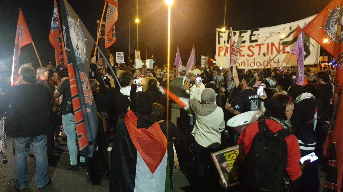 Strong community picket, with Palestinian community leaders and MUA officials and delegates at the front, has shut down Patrick Terminal at Port Botany protesting the Israeli ZIM shipping line.

Sanction Israel! Shut down business as usual!