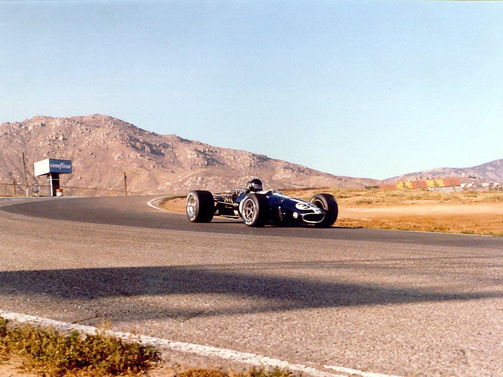 I took this picture back in 1984 before Riverside closed. It was a shake down for a vintage race in Palm Springs. I think there was a magazine photo shoot that day too. Kind of cool, the Goodyear sign, turn six grand stands, mountain in the background and Big D turn seven.