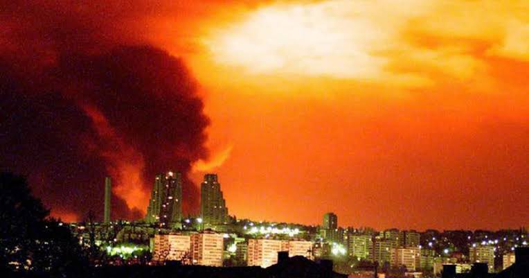Kanthan2030's tweet photo. On this day 25 years ago, NATO started the brutal 78-day bombing of Yugoslavia (Serbia).

It was also illegal, done without UN approval.

10,000+ by missiles were dropped on Belgrade and elsewhere. 

The goal? To create Kosovo, where CIA-armed terrorists, KLA — like ISIS — were working for the US empire.

It was also a message for the world — “There’s a new global military, NATO, that operates beyond the norms of international laws. Beware!”