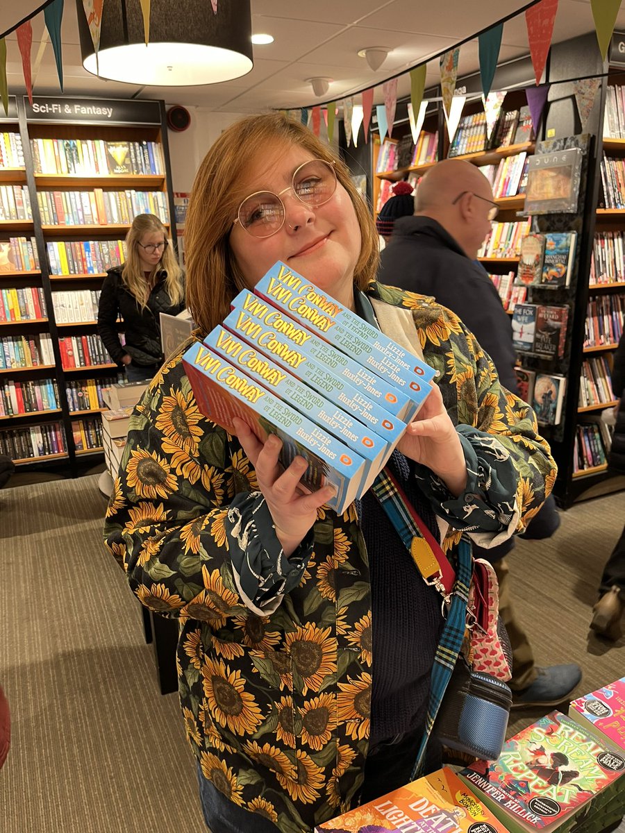 hux | lizzie huxley-jones 🍟📚 (they/them) (@littlehux) on Twitter photo I’ve left some signed copies of Vivi Conway and the Sword of Legend in Cirencester! There’s one copy in the gorgeous <a href="/octaviabookshop/">Octavia's Bookshop</a> (a must visit!) and a fresh little stack in <a href="/WaterCiren/">Bookshop & Cafe</a> too 🗡️🌊✨ I’ve left some signed copies of Vivi Conway and the Sword of Legend in Cirencester! There’s one copy in the gorgeous <a href="/octaviabookshop/">Octavia's Bookshop</a> (a must visit!) and a fresh little stack in <a href="/WaterCiren/">Bookshop & Cafe</a> too 🗡️🌊✨