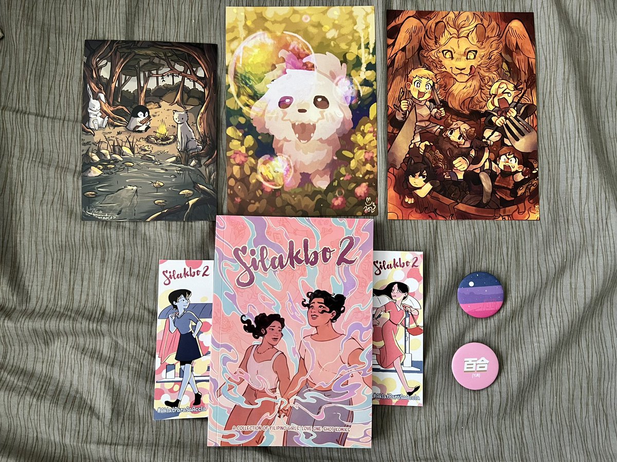 Komiket haul! There were so many artists with super pretty art~ i’ve been looking at more original works and i’m happy 😌
- rabbit, penguin, cat print from @ArtByLWs
- dog + danmeshi print from @taffybuns
- Silakbo 2 (GL anthology) from @kalabawstudios
-  wlw pins from @/kamavela