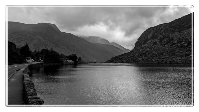 One of the most #stunning areas of the #world is #Eryri #Snowdonia #NationalPark @visit_snowdonia @visitsnowdonia. Even more during #moody #weather like this #image of #llyn #Ogwen. A #beautiful #lake in #NorthWales. #landscapelovers #blackandwhitephotography @visitwales