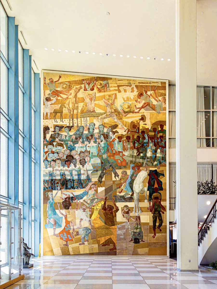 A view of the south lobby of the General Assembly building at #UNHQ in #NYC, picturing one of two murals, each measuring 34 by 46 feet, entitled 'War and Peace' by #Brazilian 🇧🇷 artist Candido Portinari. The murals were donated to the @UN 🇺🇳 in 1957. #UNArtTour #VisitUN