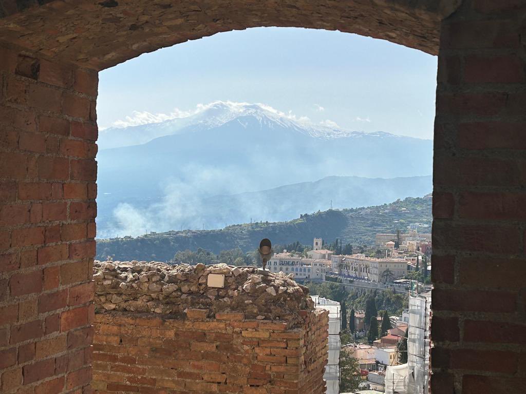 Stunning views of Mount Etna and the bay from Teatro Antico di Taormina