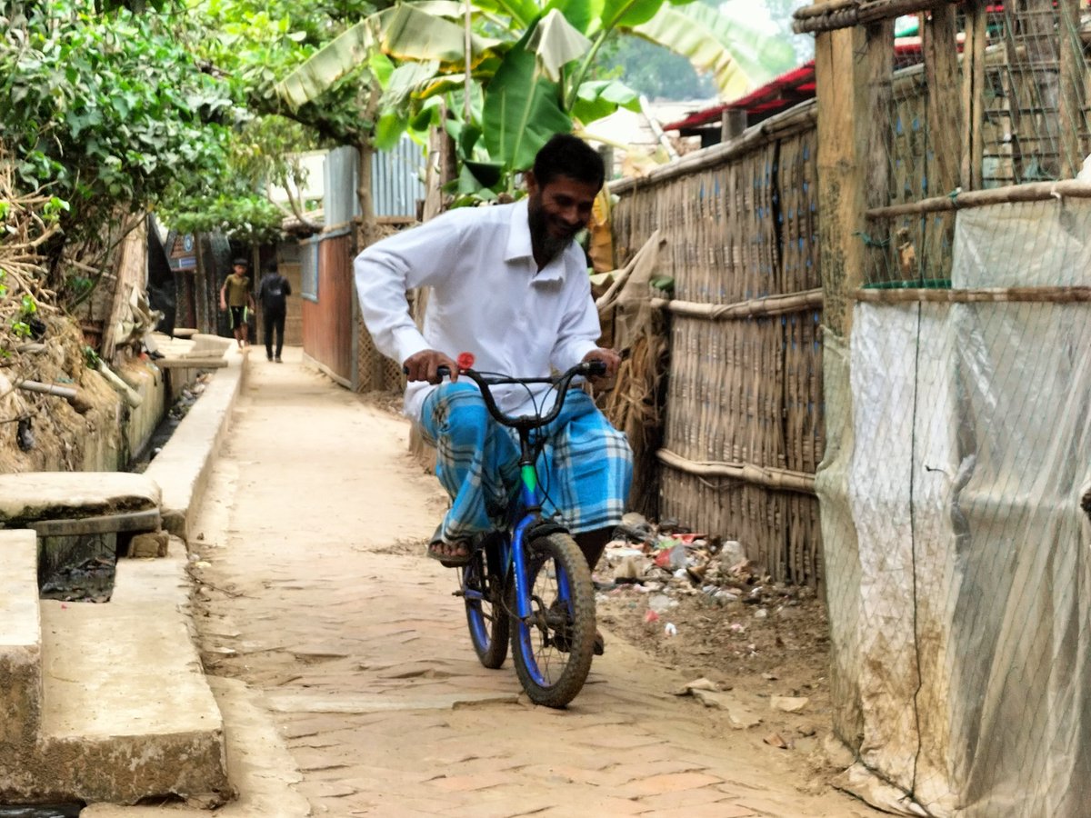 An elderly rohingya man is trying to ride a small bicycle which he rode when he was a child

#Elderlyperson 
#rohingyamuslims 
#photographylife