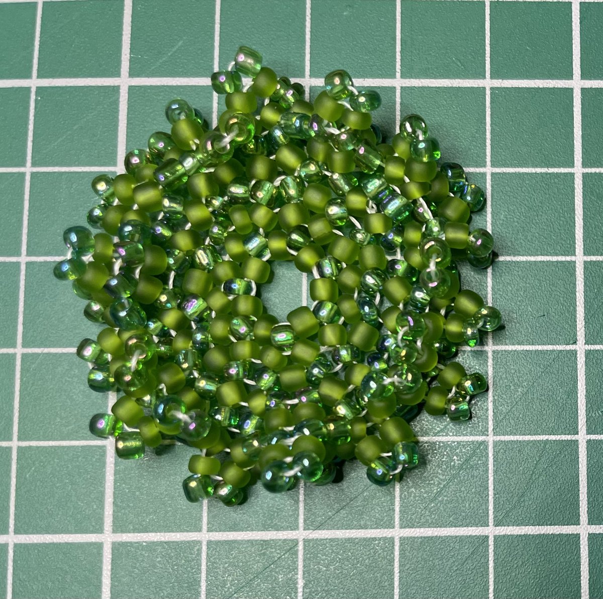 CarolineHack's tweet image. Thought I’d followed the circular #herringbone #BeadWeaving instructions but went wrong somewhere. Rather like the effect though. #HappyAccident