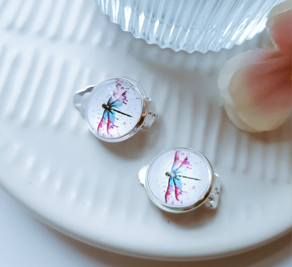 Super cute paint effect dragonfly earrings. These are a clip-on style but can be adjusted to pierced studs. #CraftBizParty #EtsySeller #giftideas