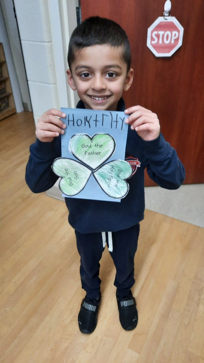 A showing off his Holy Trinity shamrock - we learned how St. Patrick used a shamrock to teach about God, Jesus and the Holy Spirit as one ☘️☘️☘️ #focusonfaith @stanne_school