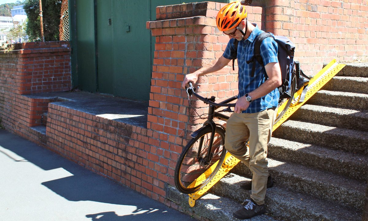 Tilleyone's tweet image. A cycle &amp;amp; scooter ramp that can handle corners with minimal prep? Too easy 
tilleystreetandparkfurniture.co.nz/products/wheel…
#tilleygroup #cycleinfrastructure #bikelife #madeinnz #nzmade #facilitiesmanagement #urbandevelopment #landscapedesign #nzia #streetandparkfurniture #streetfurniture #urbanmobility