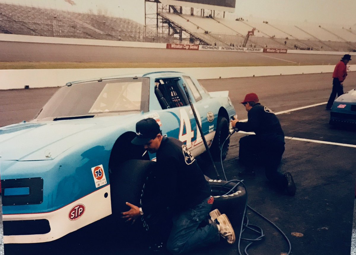 Richmond 1991: Driver Ritchie Petty. Mark Petty and Rick McPherson changing tires getting ready for practice. Looks like Emanuel Zervakis in the background.