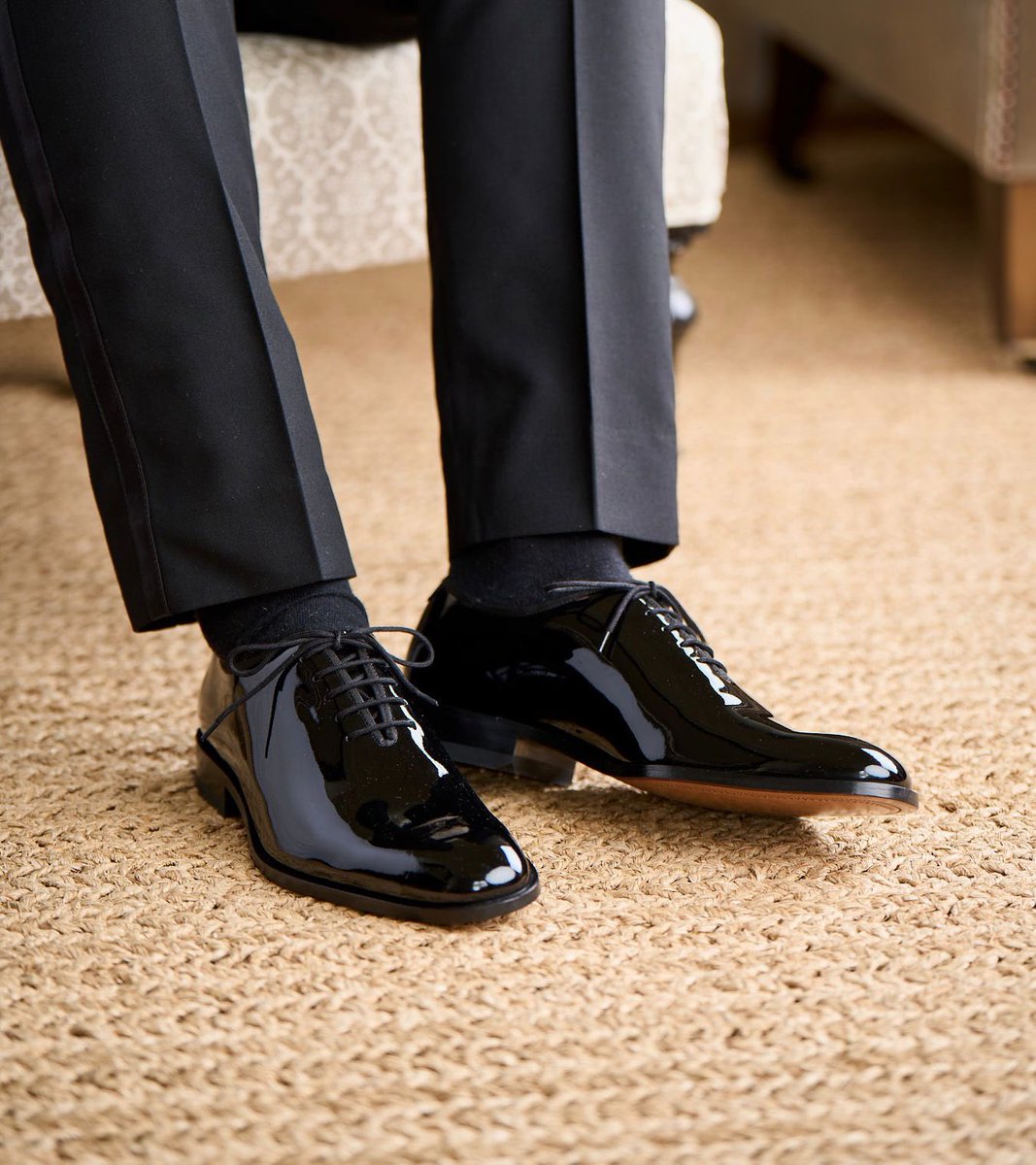 Footwear to go with your Dinner suit does not have to be boring like a pair of black shoes! add a little flair with patent leather shoes. In modern times these have been overlooked, but are actually what was traditionally worn with this type of outfit.  tinyurl.com/55enpuu3