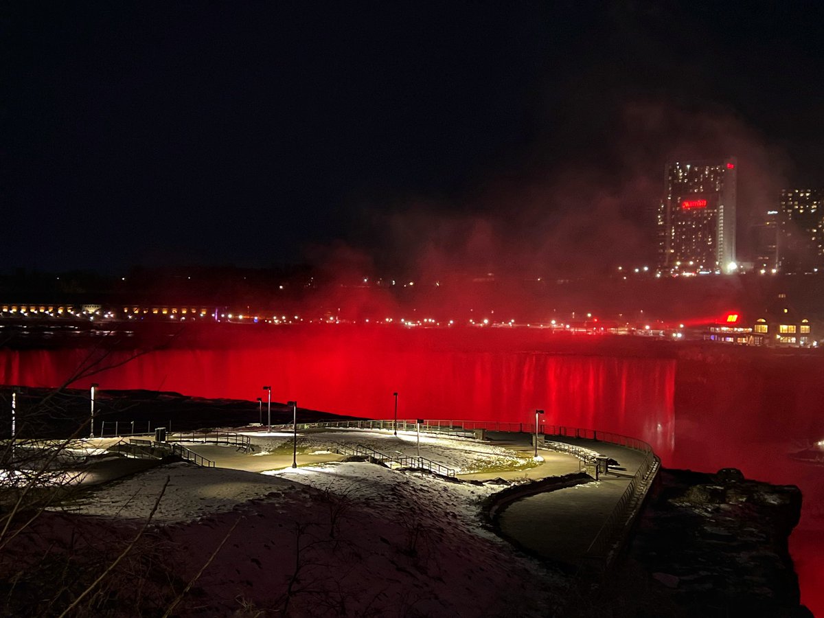 I didn't get the best view possible but it was a treat to see this in person! For twenty minutes tonight, Niagara Falls was illuminated red for #WorldTBDay2024 and I'm so proud to have helped make this happen ❤️✊ #EndTB