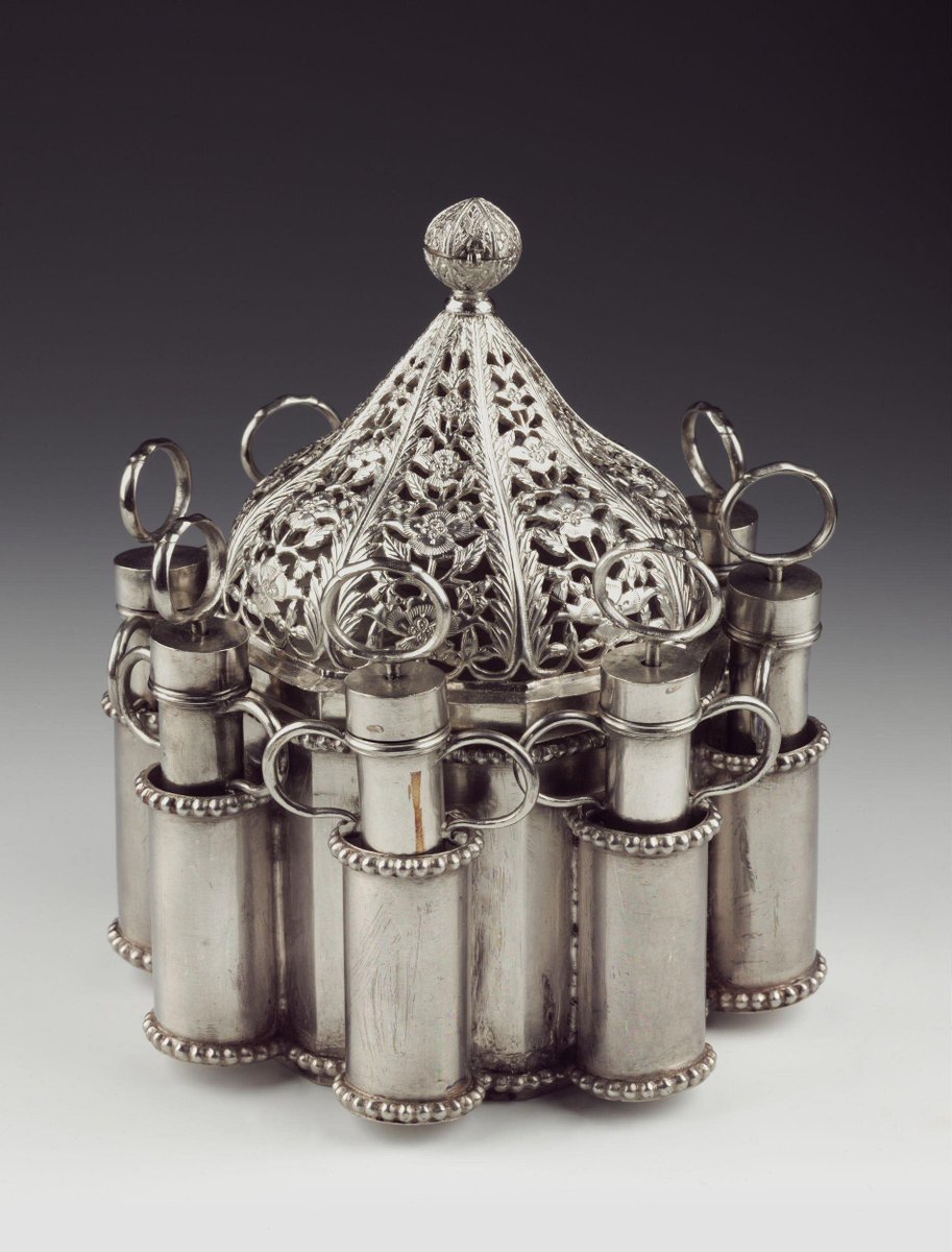 And then there is #object #material #history of #Holi Rosewater stand, silver, octagonal with perforated dome-shaped cover, surrounded by 8 syringes for Holi,#Delhi ,1800-1870. V&A. When #rosewater was used! #Roses always 🌹 @DalrympleWill @iamrana @ranjona @zebtariq #craft