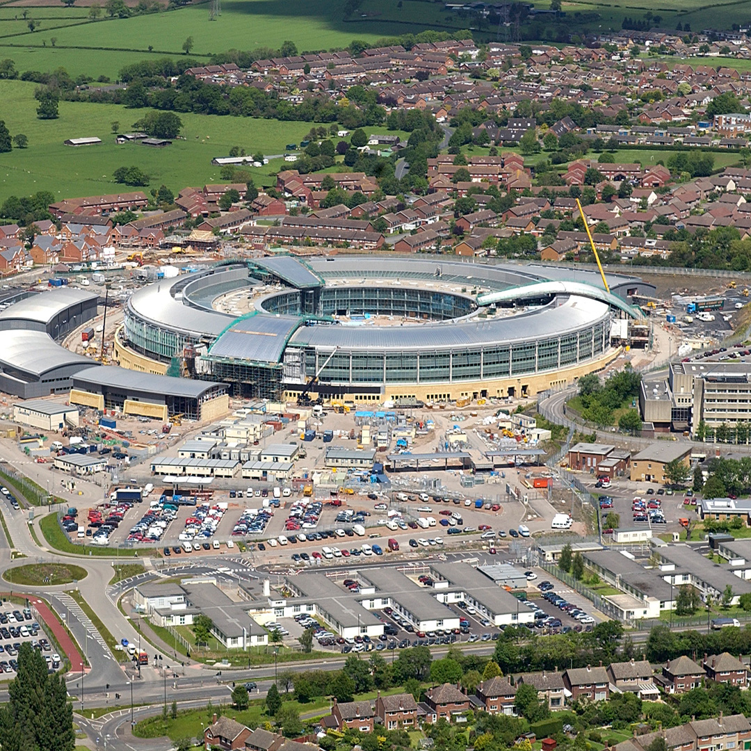 Today marks 20 years since Queen Elizabeth II opened our headquarters in Cheltenham, known to many as the Doughnut. To mark the anniversary, we're sharing some rarely seen images of what was the biggest building site in Europe at the time