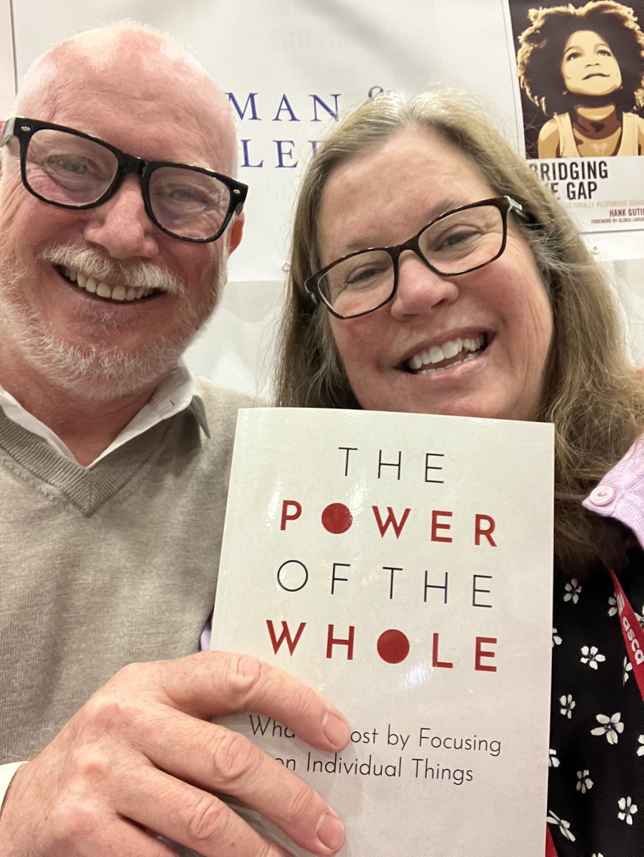 A view from this weekend of the Rowman & Littlefield booth at @ASCD and 'The Power of the Whole: What Is Lost by Focusing on Individual Things' author @SeanTSlade (l) visting editor Carrie Brandon (r) on #ASCD2024 expo floor.