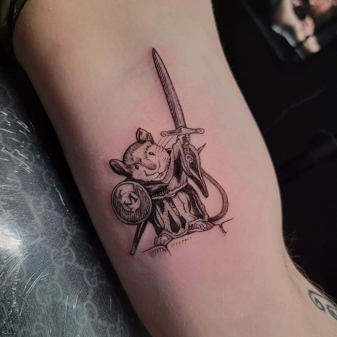 A tattoo of Matthias, inspired by Troy Howell's Redwall cover artwork. Ink by Nathan Harkins-Oberbeck, Hidden Vibes Tattoo, Cambridge, MA. redwall.fandom.com/wiki/Redwall_T…