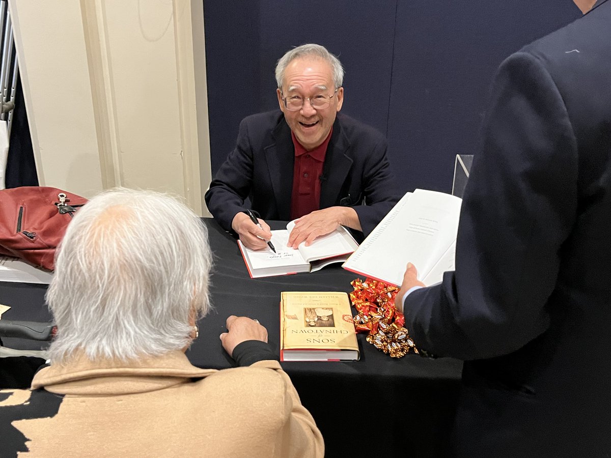 William Gee Wong signing copies of his dual memoir, SONS OF CHINATOWN at the Oakland Asian Cultural Center yesterday.