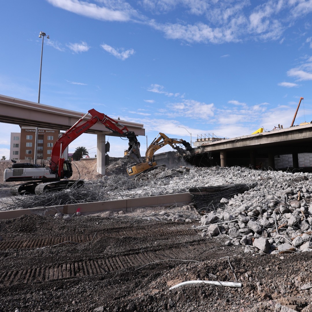Crews recently wrapped up demo weekend at the I-15 Tropicana Design-Build Project in Las Vegas, bringing down the south half of the Tropicana Ave bridge. The demo is part of phase three, which also includes reconstruction of a new bridge over I-15.