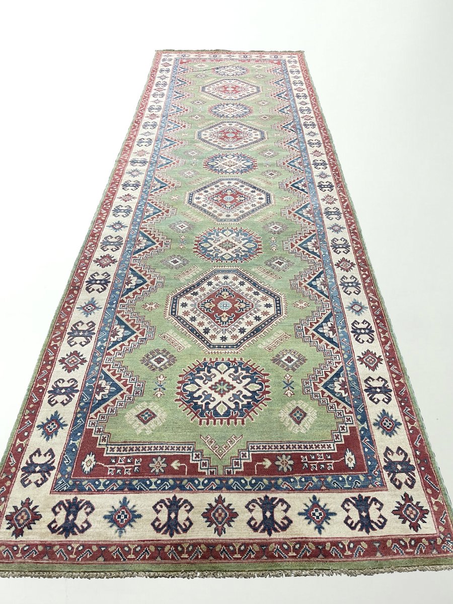 Standout from the crowd with this exceptional pale green background Kazak Kalehgi Shop -> bit.ly/2MXfU07 #interiordesign #homedecor #shopsmall #rug