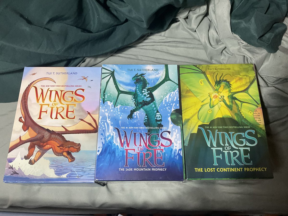 So I figured I finally start on Wings of Fire but unfortunately the books were next to impossible to find in the UK so I decided to buy them online.

And instead of buying a few books to start off with, I made the logical decision… of buying the whole collection.
#WingsofFire