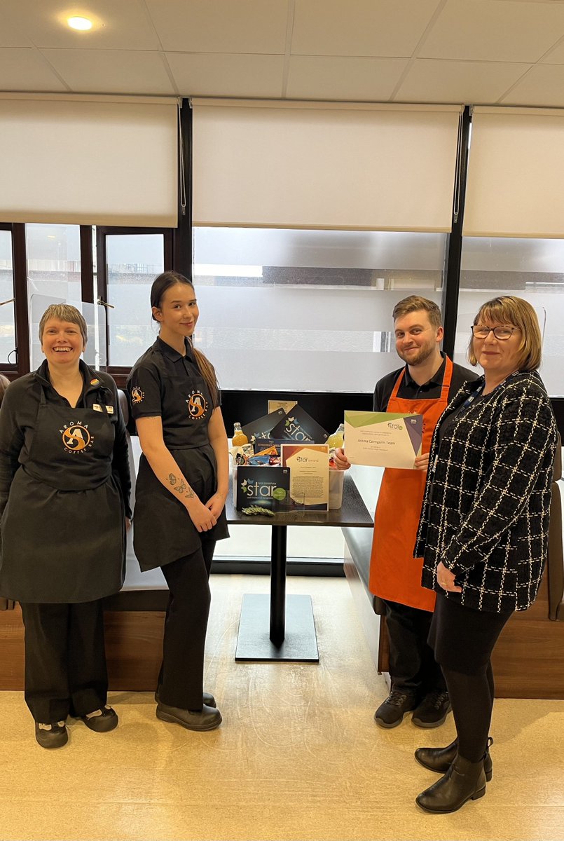 Elinor (R), our Head of Catering presenting staff on duty at Aroma Concourse with their Team Star Award. So well deserved - well done to all the Team for the difference they make. #proudtobenhsg
