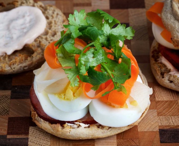 Ellie_Krieger's tweet photo. Take your basic #breakfast sandwich up a few notches w/ easy, healthy Bahn Mi-inspired layers: tangy, quick pickled vegetables, #yogurt-based #Sriracha-spiked sauce &amp; cilantro. All the elements can be prepped ahead, so you can pull it together fast. https://t.co/LrD9fa805i #eggs https://t.co/ycUCfSd1Pg