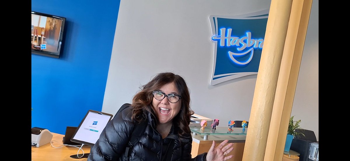 I'm at Hasbro HQ in Rhode Island today and tomorrow. Here's the lovely Tanya Thompson in the foyer. More photos tomorrow, when I know what I'm allowed to share.