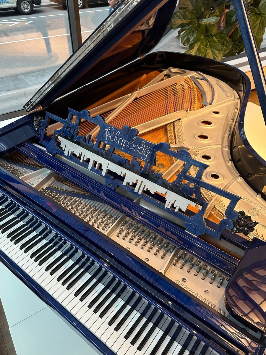 Steinway's 'Rhapsody in Blue' piano on display at Steinway Hall in NYC 🎹✨💙