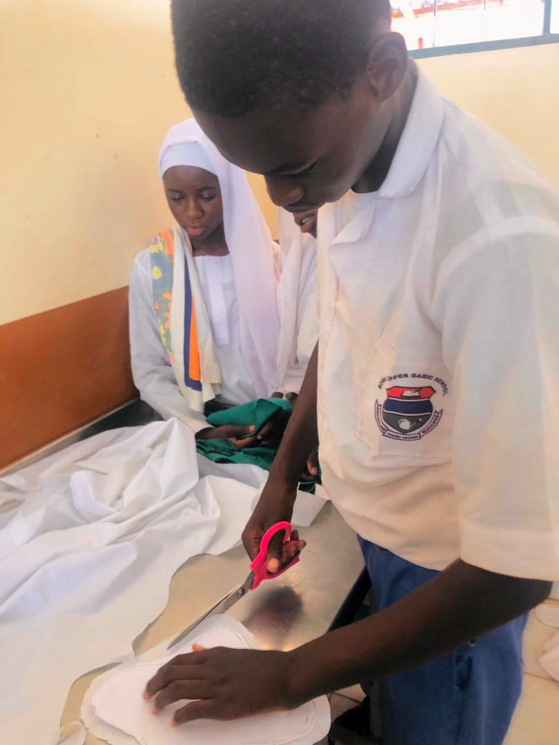 GirlsPrideGam's tweet photo. School boys in LRR are diving into Home Science class by learning how to make handmade reusable pads for their sisters to manage their periods with dignity. Let's support &amp; encourage male involvement in SRH projects &amp; eradicate period poverty in Gambia.
#CFLIGM #StepDownTraining https://t.co/oaENU3m4Qc