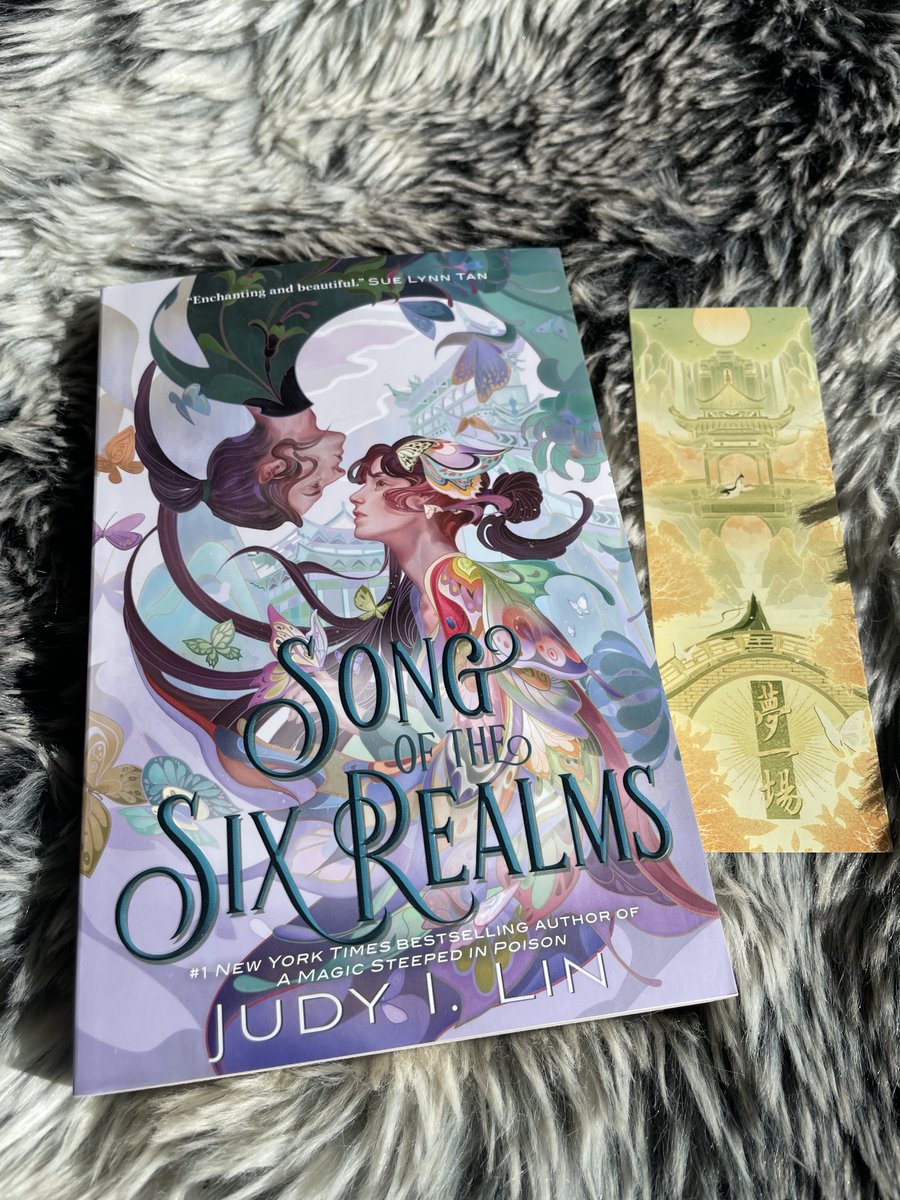 I wasn't sure if a copy of SONG OF THE SIX REALMS would arrive on time, but it did and I will offer all this in the #KidLit4CeaseFire auction bundle: 
- Signed & personalized hardcover copies of the TEA duology, paperback of SONG
- Stickers, map, enamel pin, art-print, bookmark