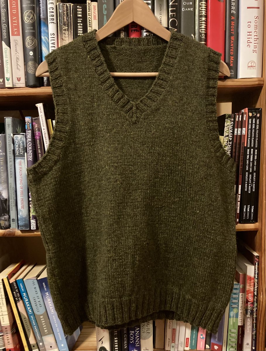 Vest complete! It has been described as 'cosy, with a hint of wood elf with a sword.' That description made me very happy. Yarn is Blasta by @StolenStitches and is perfect for this piece. #knittingtwitter