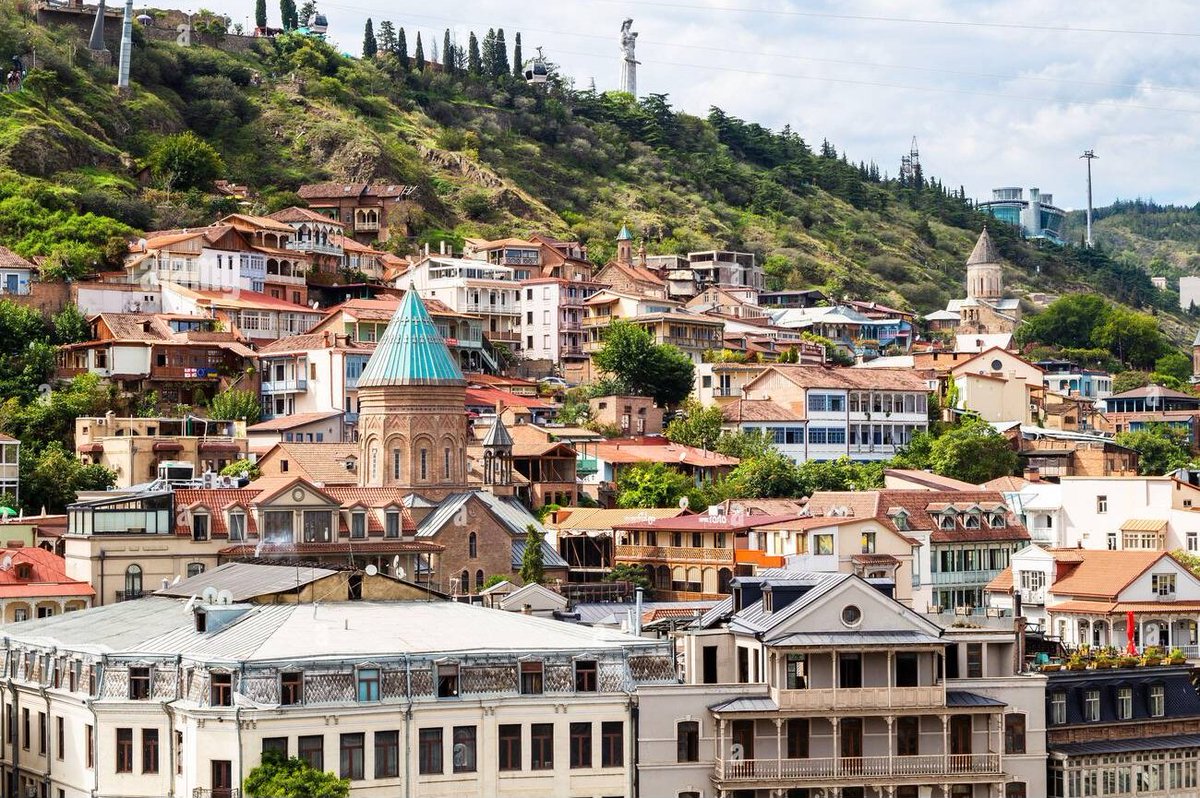 🌍 Tbilisi, Georgia - September 26, 2023: view of old town on slope of Mtatsminda hill from Metekhi viewpoint in Tbilisi city on sunny autumn day. Photographer 📸 Valery Voennyy ●•