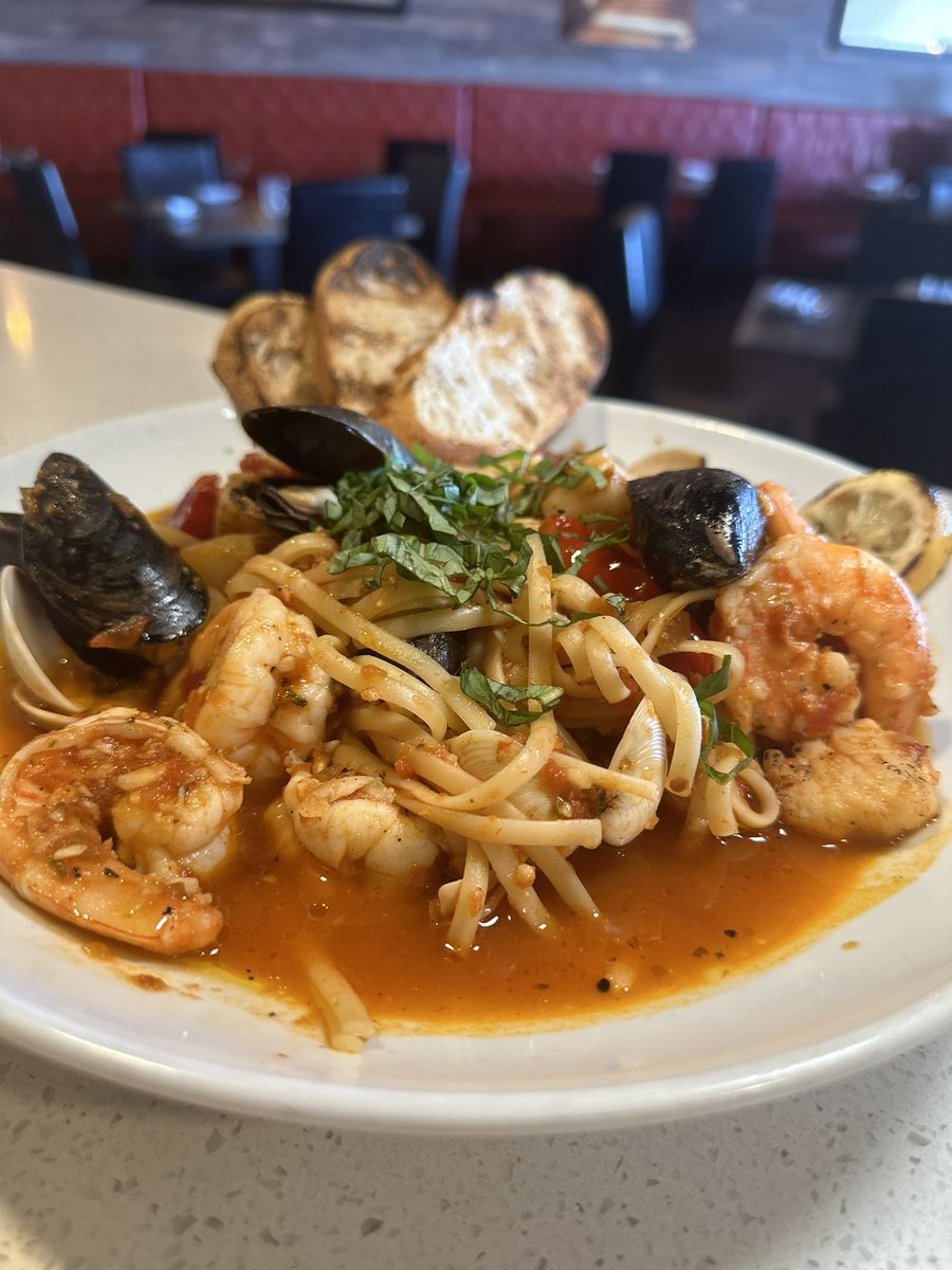 Seafood Diavolo Medley of mixed seafood, garlic, calabrian chili , arrabbiata tomato sauce, basil and EVO special here at Sam & Luca Rustic Kitchen #seafood #diavolo #fish #seafood