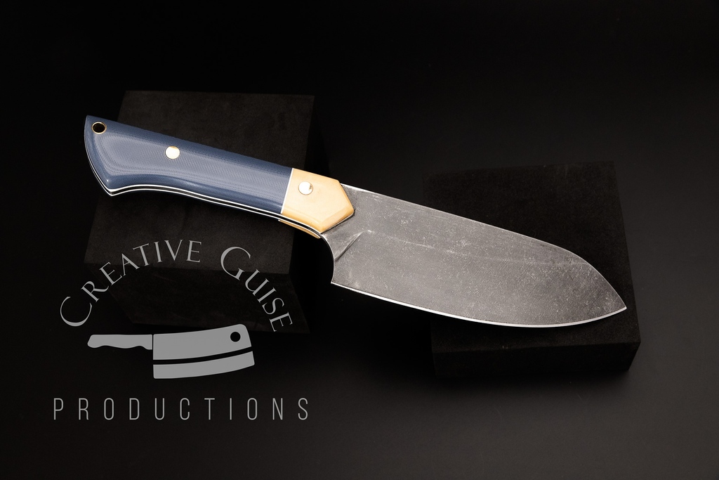 Six Inch Carnivore Chef in Acid Etched, Rock Tumbled 52100 High Carbon Steel wrapped with Blue and Bone Segmented Micarta Handle Scales.

l8r.it/v0dT

#KitchenKnife #ChefKnife #Chef #knifelife #knives #edc #knifemakers #knifecommunity #custom #knifeporn