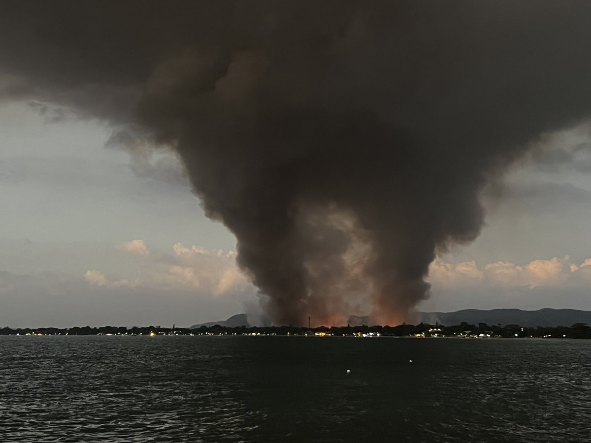 My view of seven mile beach in #Negril tonight. How many vacationers are sitting on the beach with no idea the Great Morass national park is on fire behind them? #ClimateCrisis #Jamaica