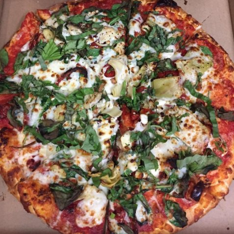It's #NationalSpinachDay! Celebrate these nutritious, delicious plants by ordering our Pandora's Box signature #pizza! Mozzarella, feta, spinach, artichoke hearts, sun-dried tomatoes, pureed garlic, oregano & fresh basil (our savory tomato sauce upon request).  Photo by Dave W.