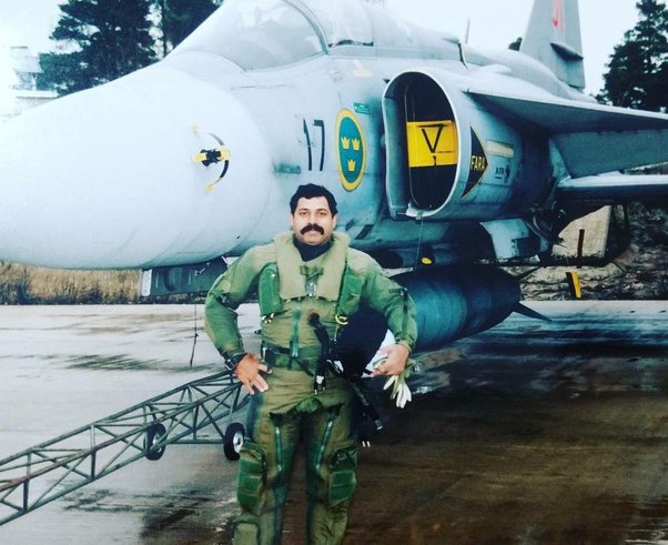 Found one more, our former Air chief in front of the Swedish Saab Viggen, and interestingly it's a single-seater. 
As someone commented once 'Even his stache is like the wingspan of IL 76'