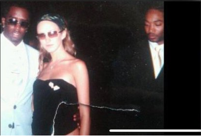 ChuckCallesto's tweet photo. SHOCK REPORT:⚠️ Photo emerges of Sean "P. Diddy" Combs with Rachel Chandler who has been linked to Jeffrey Epstein, Bill Clinton, Prince Andrew and several other Epstein associates..

BIG QUESTION, Who does that look like in the background staring at Chandler like she's BREAKFAST?