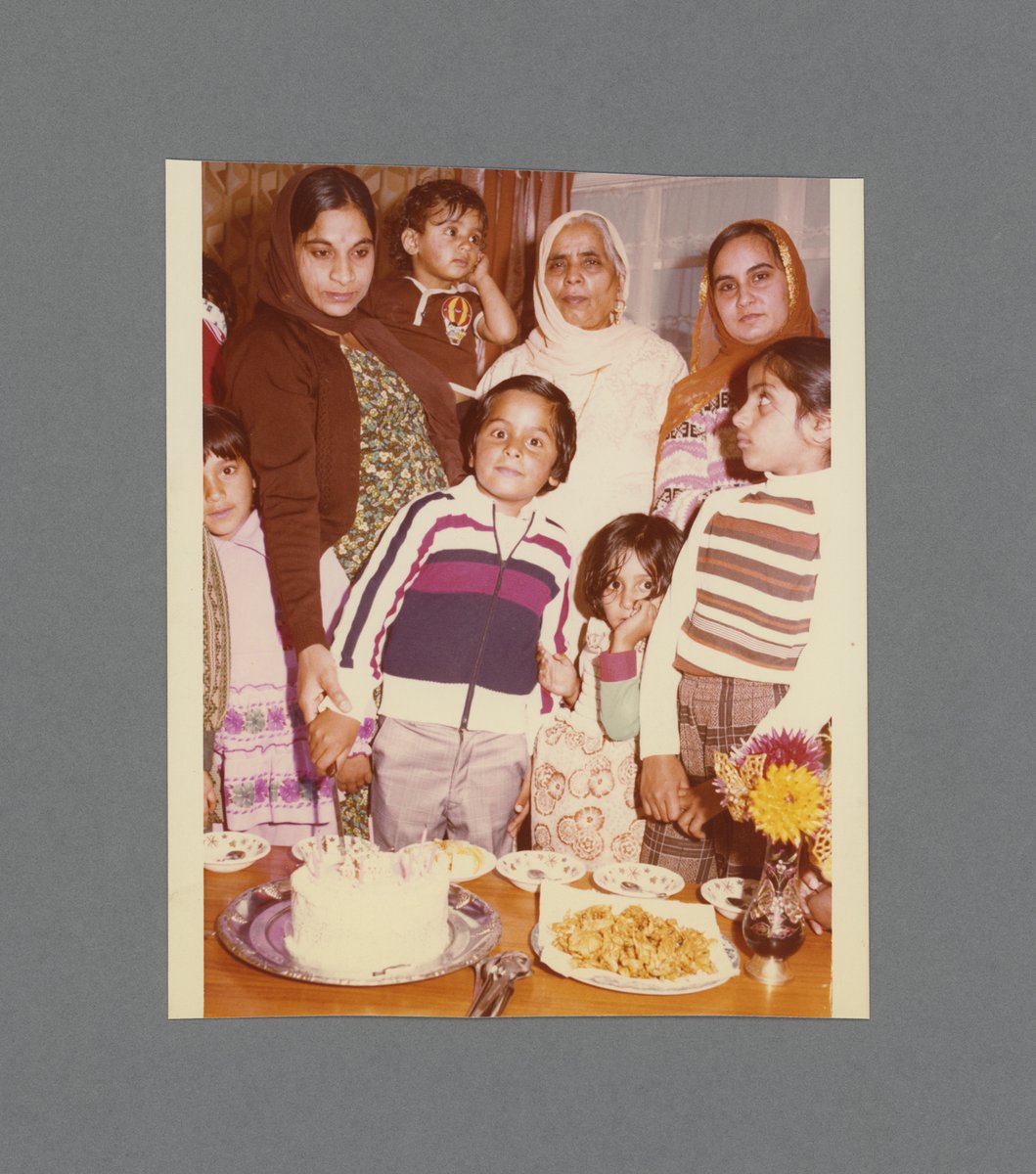 This photograph from the @apna_heritage collection shows Chander Mohan and family enjoying cake and food at a birthday party in Fairway Green, Bilston, in 1977, perfect for today's #Archive30 theme of #ArchiveFoodAndDrink @ARAScot