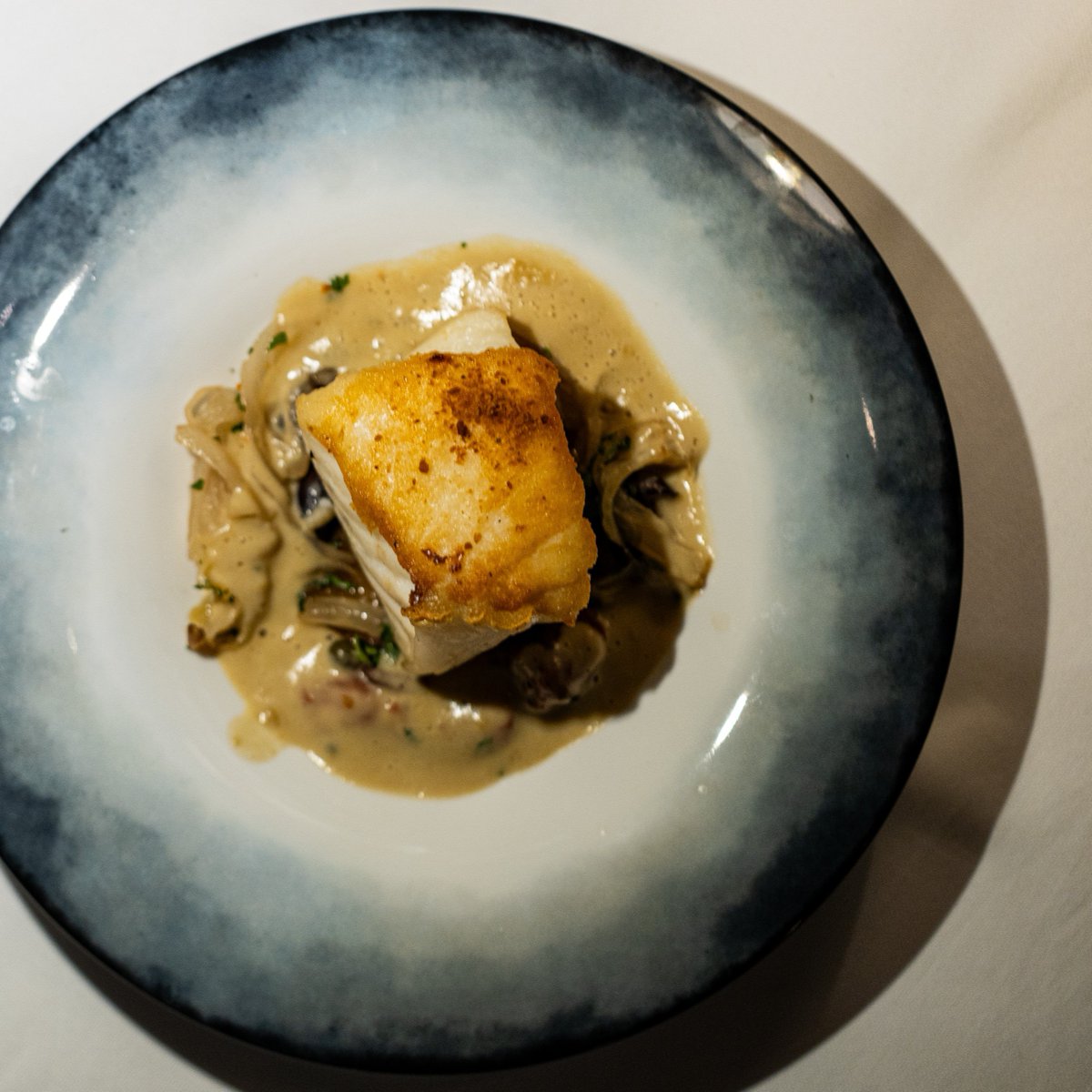 Our Merluzzo creation, featuring Chilean Sea Bass, mirrors the vastness of the ocean with its richness. Paired with chickpeas and Prosciutto San Daniele, it's a culinary voyage on a plate.​ #FSSurfside #LidoRestaurant