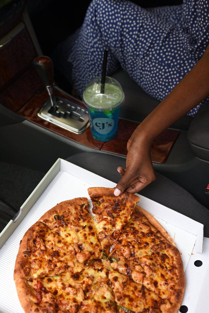 Slice of heaven: Pizza anytime, anywhere. 🍕✨ #CJs #Pizza #pizzalover